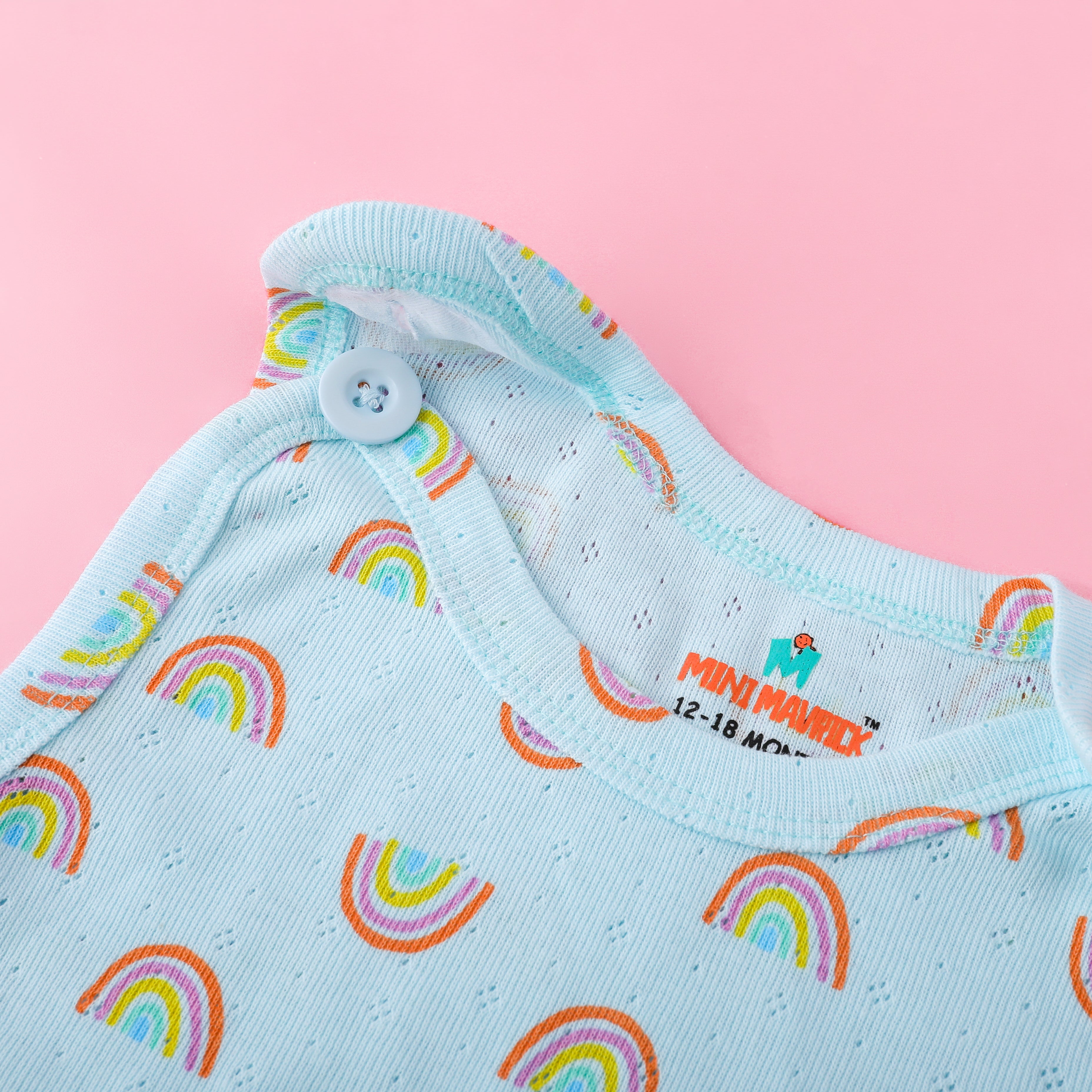 blue rainbow romper-button